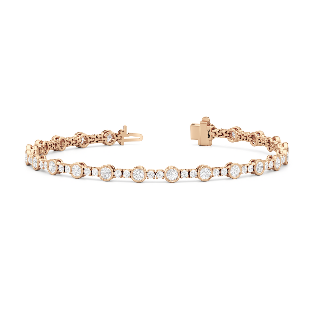 Stationed Round Bezel Set Tennis Bracelet with 3 Cut Diamond in 14KT Rose Gold view 2
