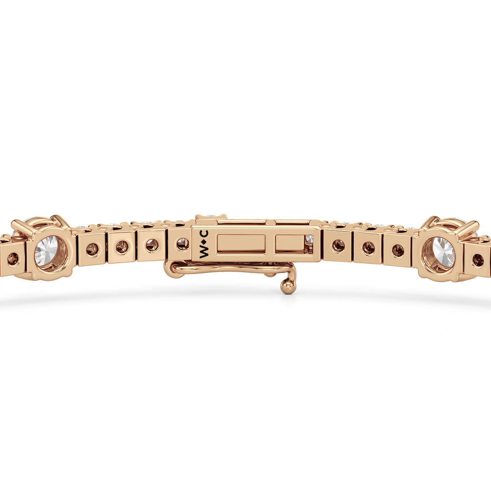 Round Station Tennis Bracelet with 3 Cut Diamond in 14KT Rose Gold view 7
