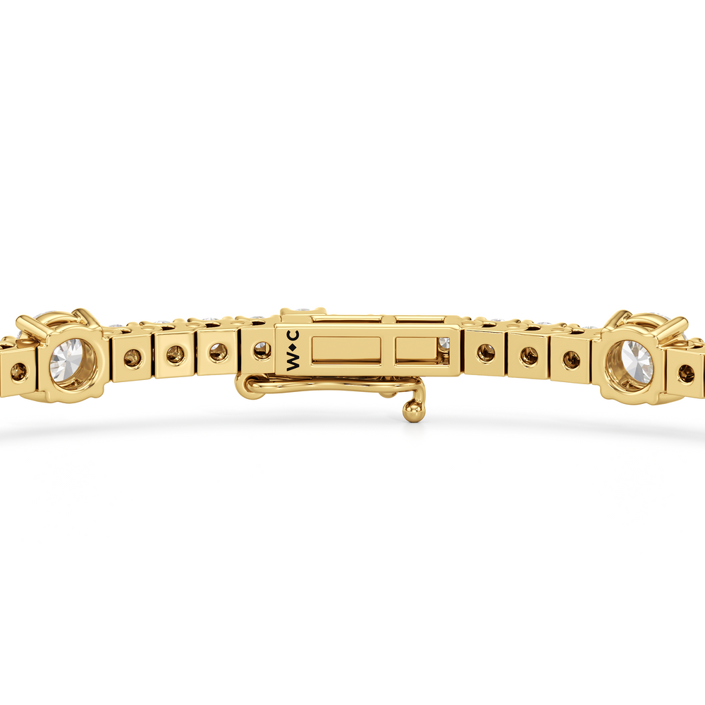 Round Station Tennis Bracelet with 3 Cut Diamond in 14KT Yellow Gold view 7
