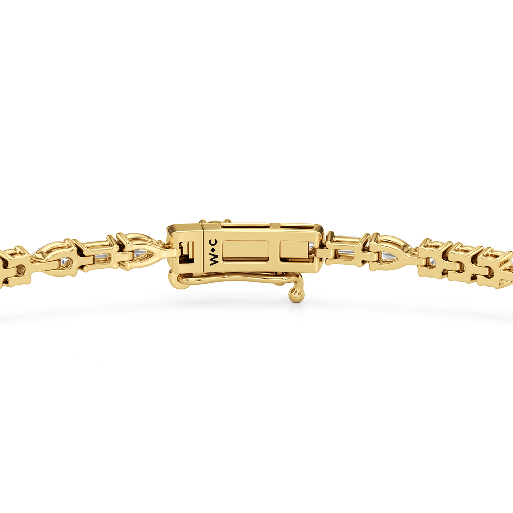 Pear, Emerald and Round Linear Tennis Bracelet with 2 3/4 Cut Diamond in 14KT Yellow Gold view 7
