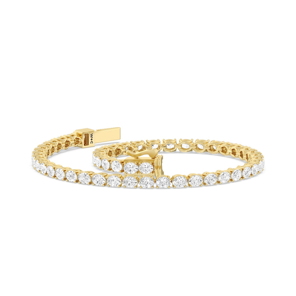 East-West Oval Tennis Bracelet with 5 Cut Diamond in 14KT Yellow Gold view 2
