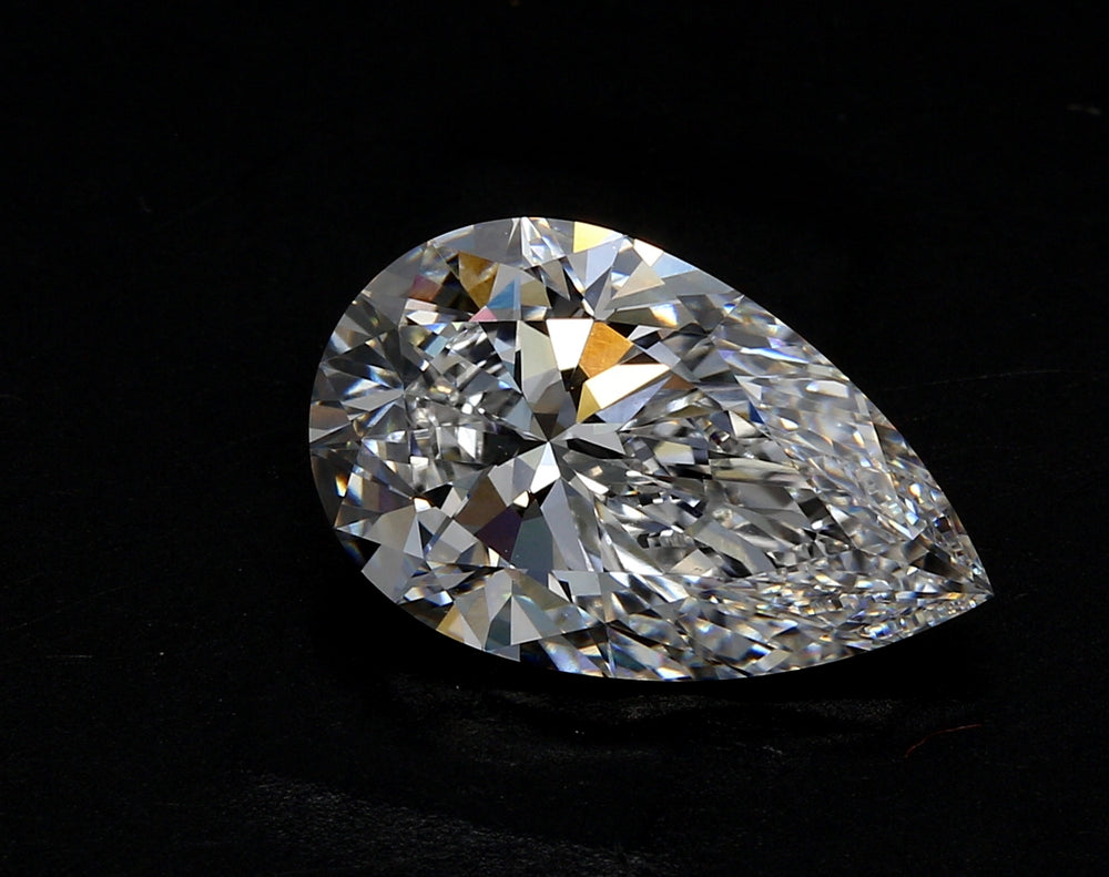2.73 Carat Pear Lab Diamond with  Cut Diamond in 14KT  view 1
