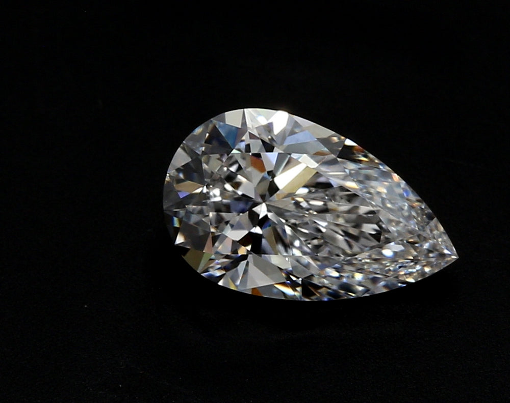 1.28 Carat Pear Lab Diamond with  Cut Diamond in 14KT  view 1
