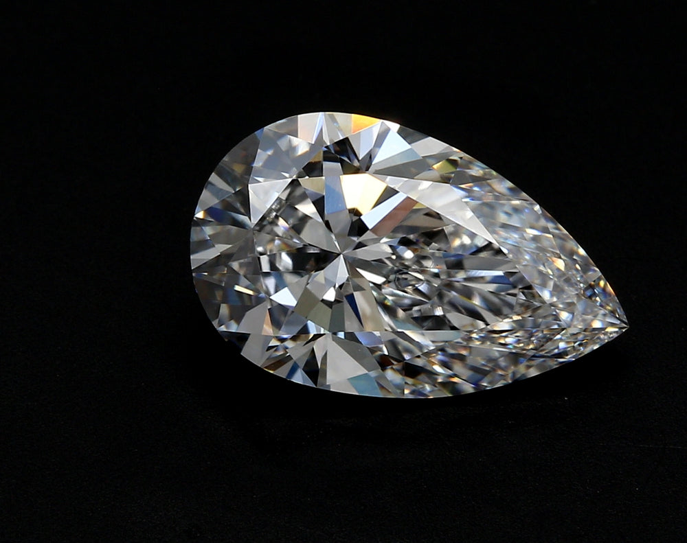 2.55 Carat Pear Lab Diamond with  Cut Diamond in 14KT  view 1
