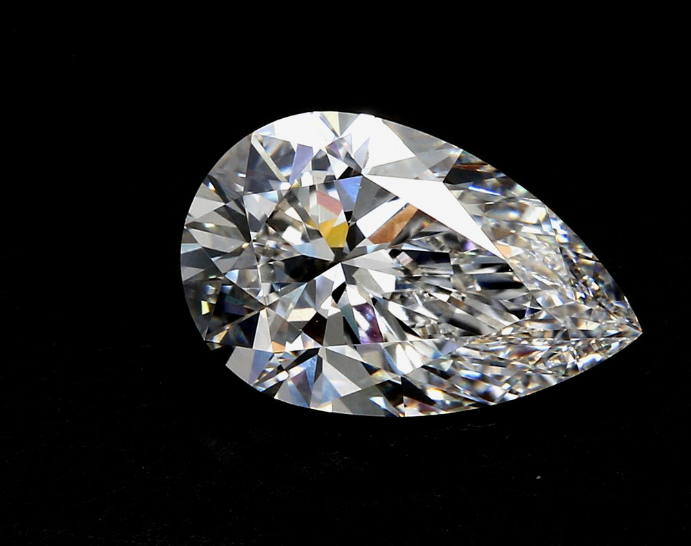 2.55 Carat Pear Lab Diamond with  Cut Diamond in 14KT  view 1
