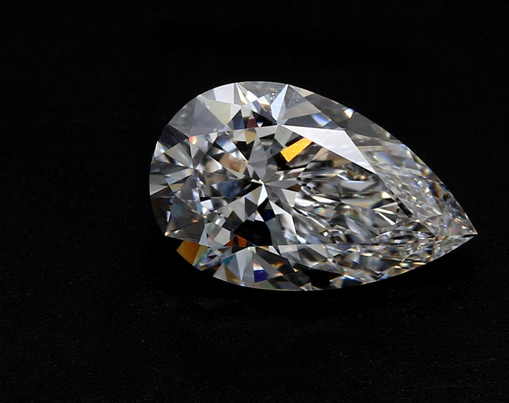 7.52 Carat Pear Lab Diamond with  Cut Diamond in 14KT  view 1
