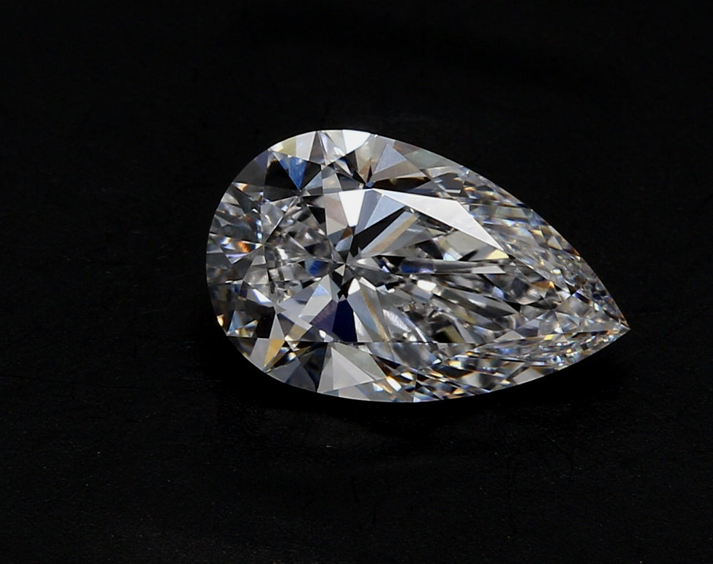 3.85 Carat Pear Lab Diamond with  Cut Diamond in 14KT  view 1
