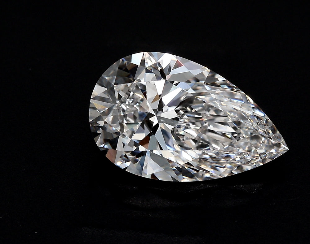 4.08 Carat Pear Lab Diamond with  Cut Diamond in 14KT  view 1
