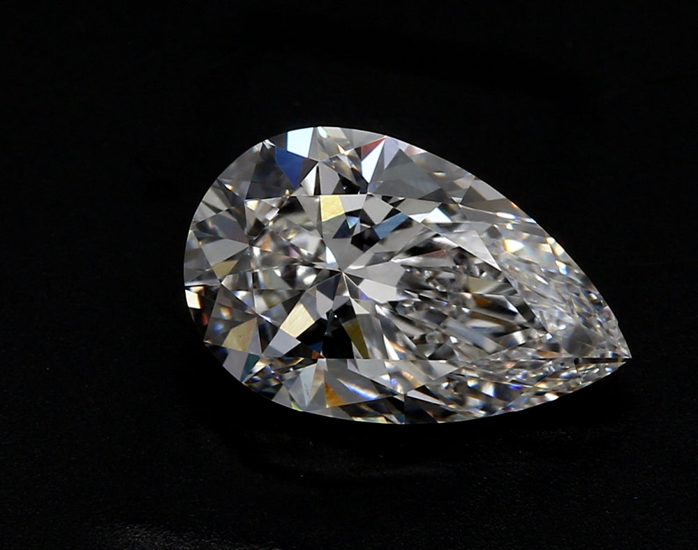 4.51 Carat Pear Lab Diamond with  Cut Diamond in 14KT  view 1
