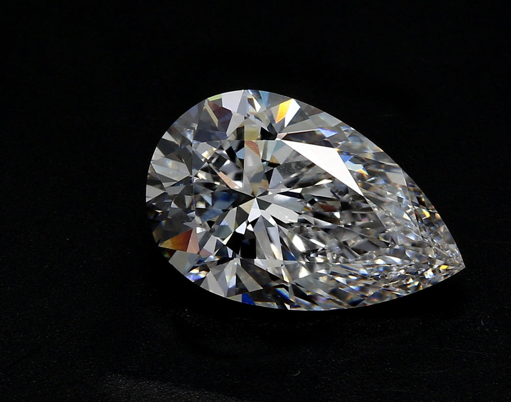 2.32 Carat Pear Lab Diamond with  Cut Diamond in 14KT  view 1
