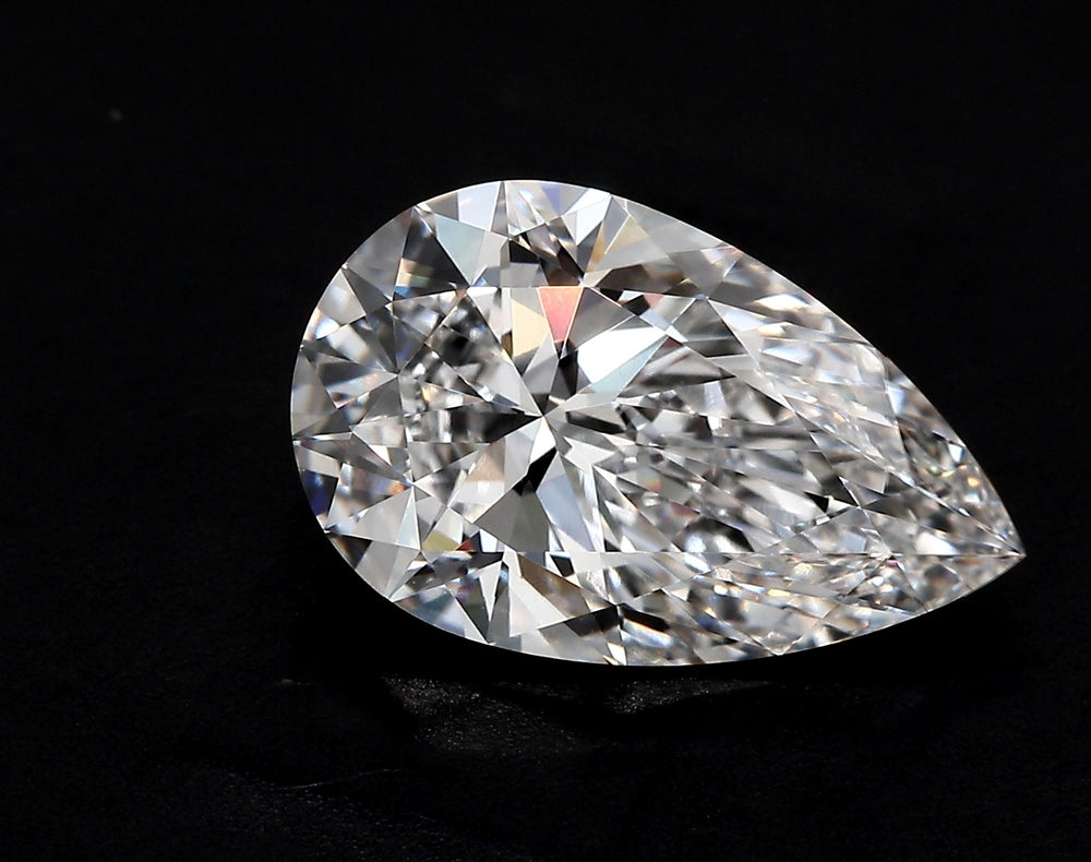 2.45 Carat Pear Lab Diamond with  Cut Diamond in 14KT  view 1
