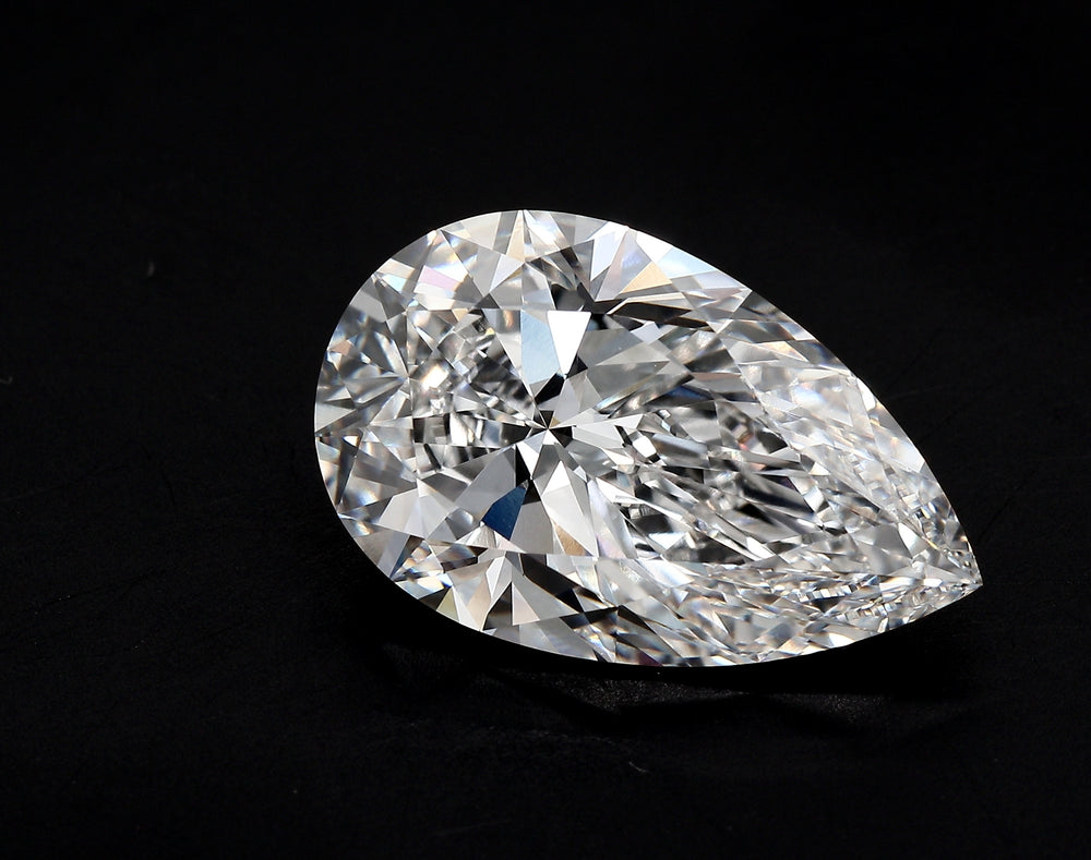 6.02 Carat Pear Lab Diamond with  Cut Diamond in 14KT  view 1
