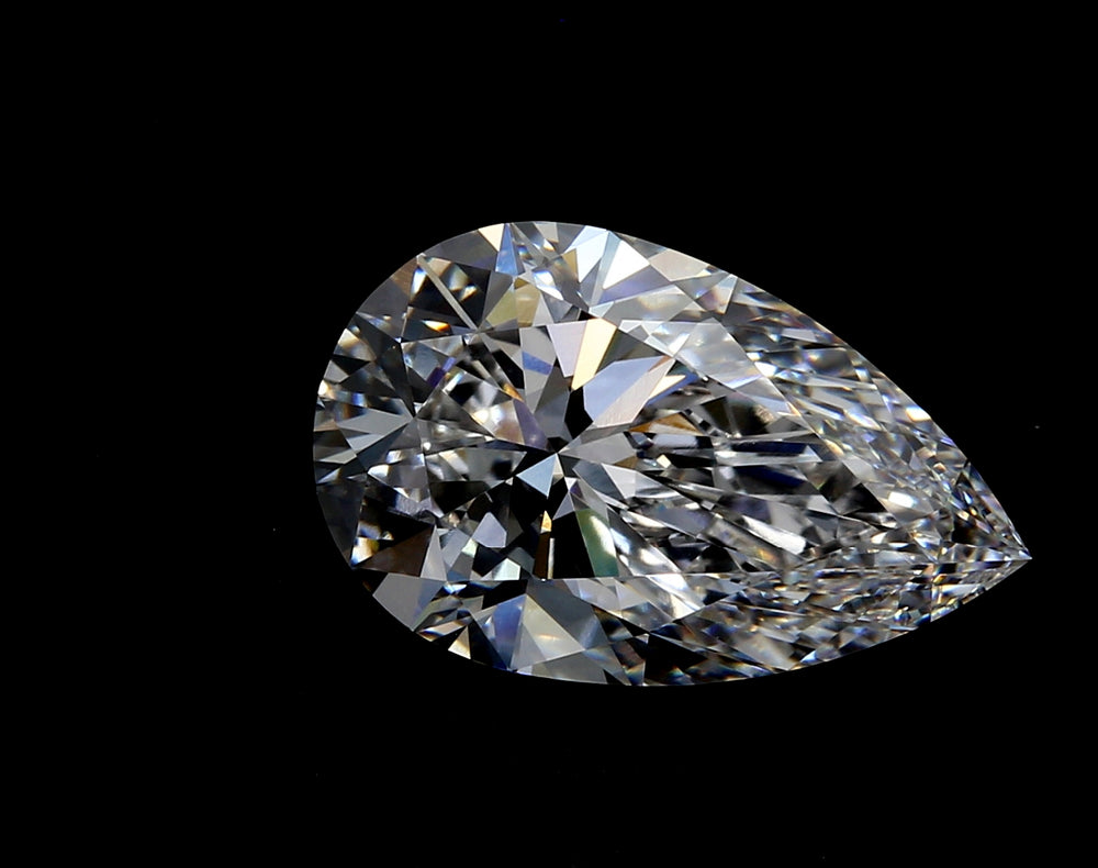 3.59 Carat Pear Lab Diamond with  Cut Diamond in 14KT  view 1
