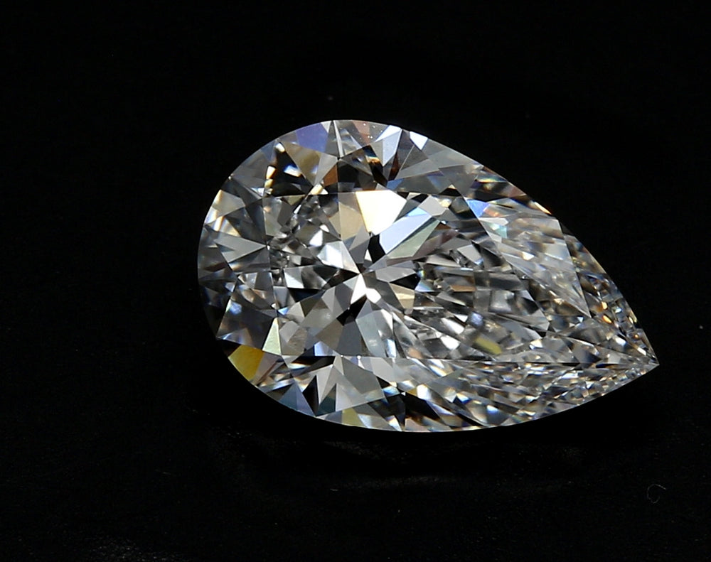 1.51 Carat Pear Lab Diamond with  Cut Diamond in 14KT  view 1
