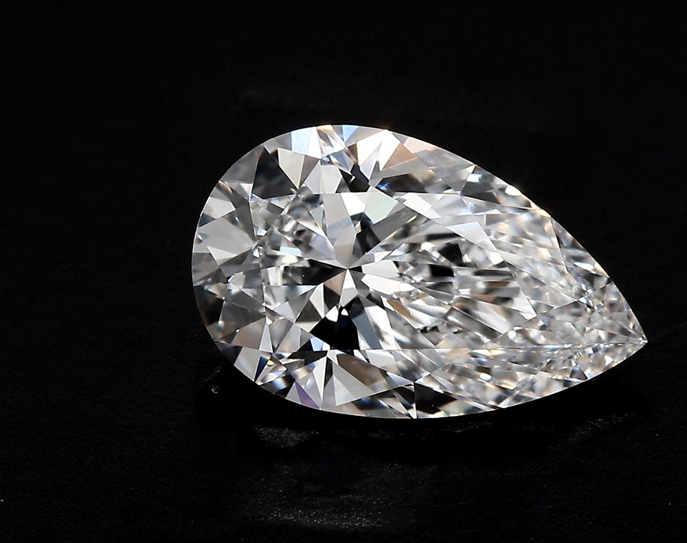 2.55 Carat Pear Lab Diamond with  Cut Diamond in 14KT  view 1
