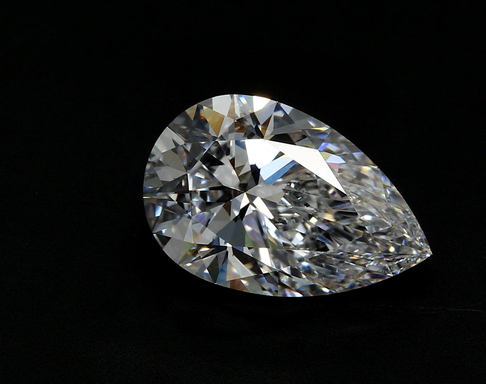1.5 Carat Pear Lab Diamond with  Cut Diamond in 14KT  view 1
