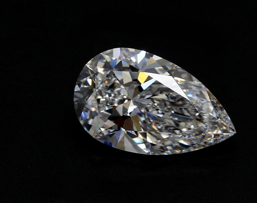 2.8 Carat Pear Lab Diamond with  Cut Diamond in 14KT  view 1

