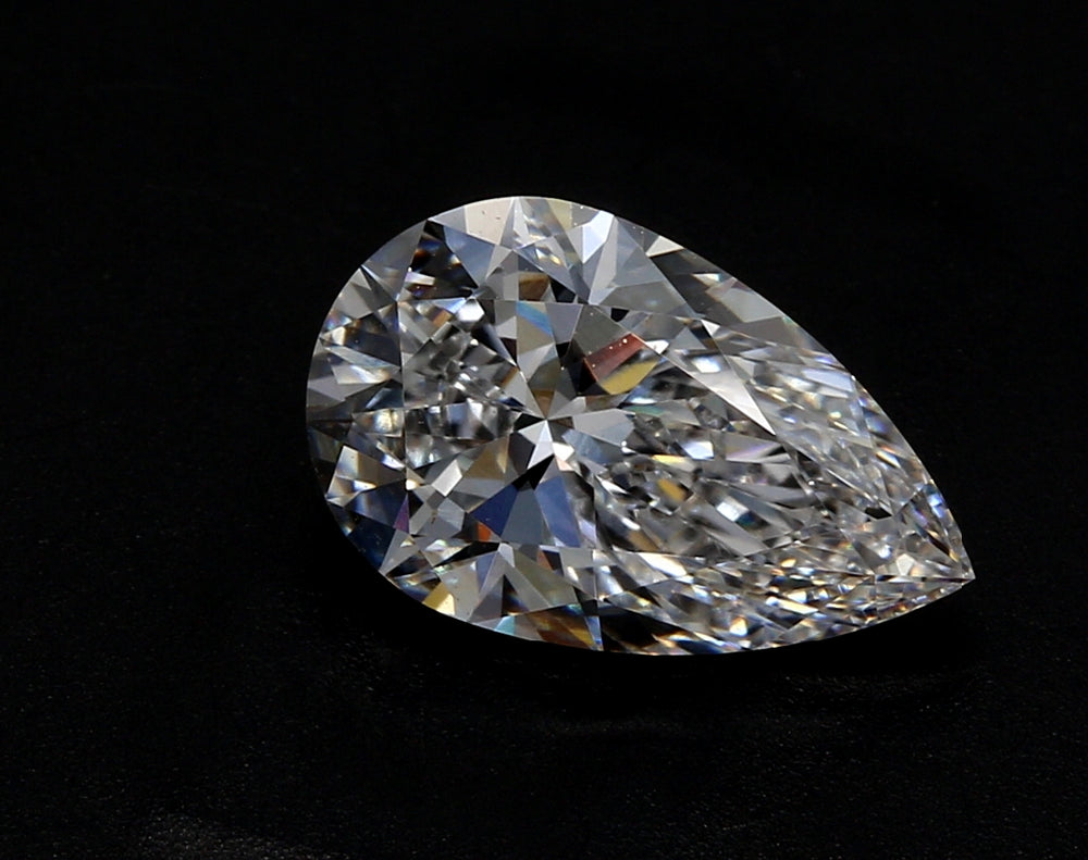 3.09 Carat Pear Lab Diamond with  Cut Diamond in 14KT  view 1
