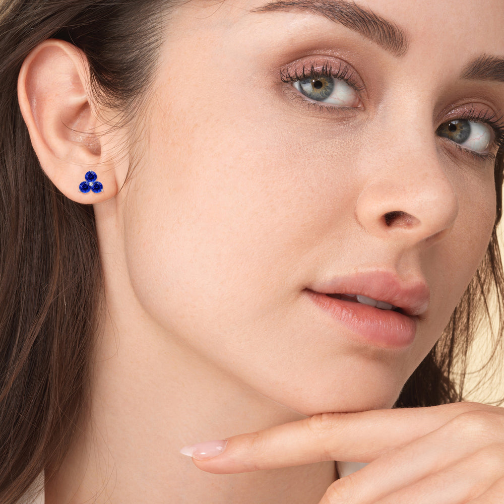 Model Wearing Sapphire Classic Three Stone Cluster Earrings view