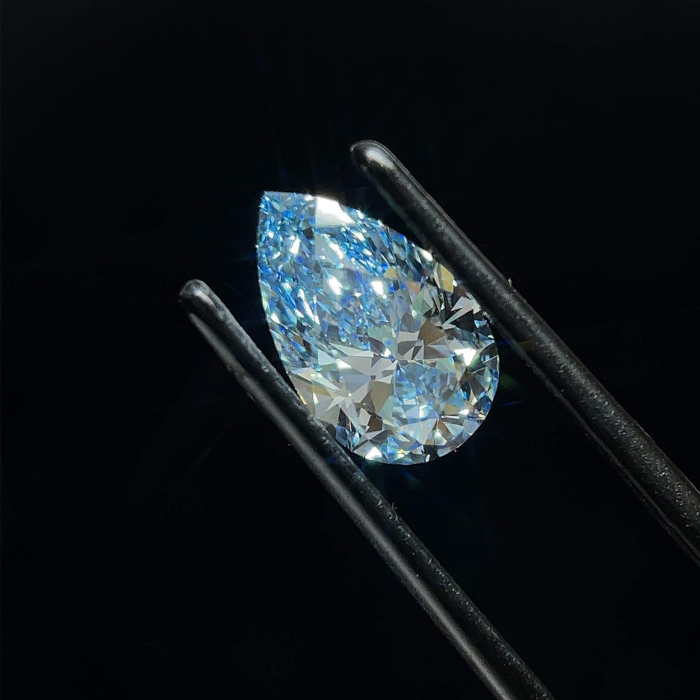 1.58 Carat Pear Lab Diamond with  Cut Diamond in 14KT  view 1
