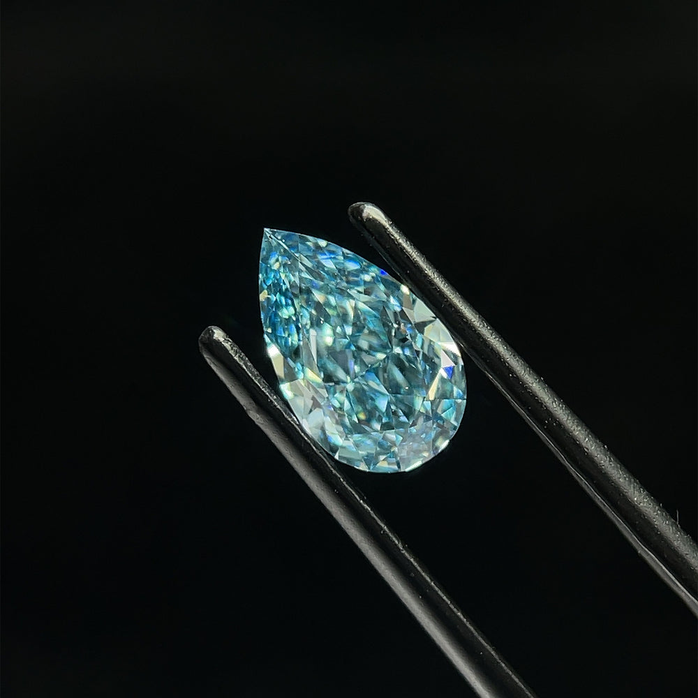 1.55 Carat Pear Lab Diamond with  Cut Diamond in 14KT  view 1
