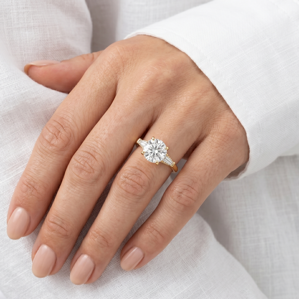 Elegance Baguette Three Stone Engagement Ring with Oval Cut Diamond in 14KT Yellow Gold view 3
