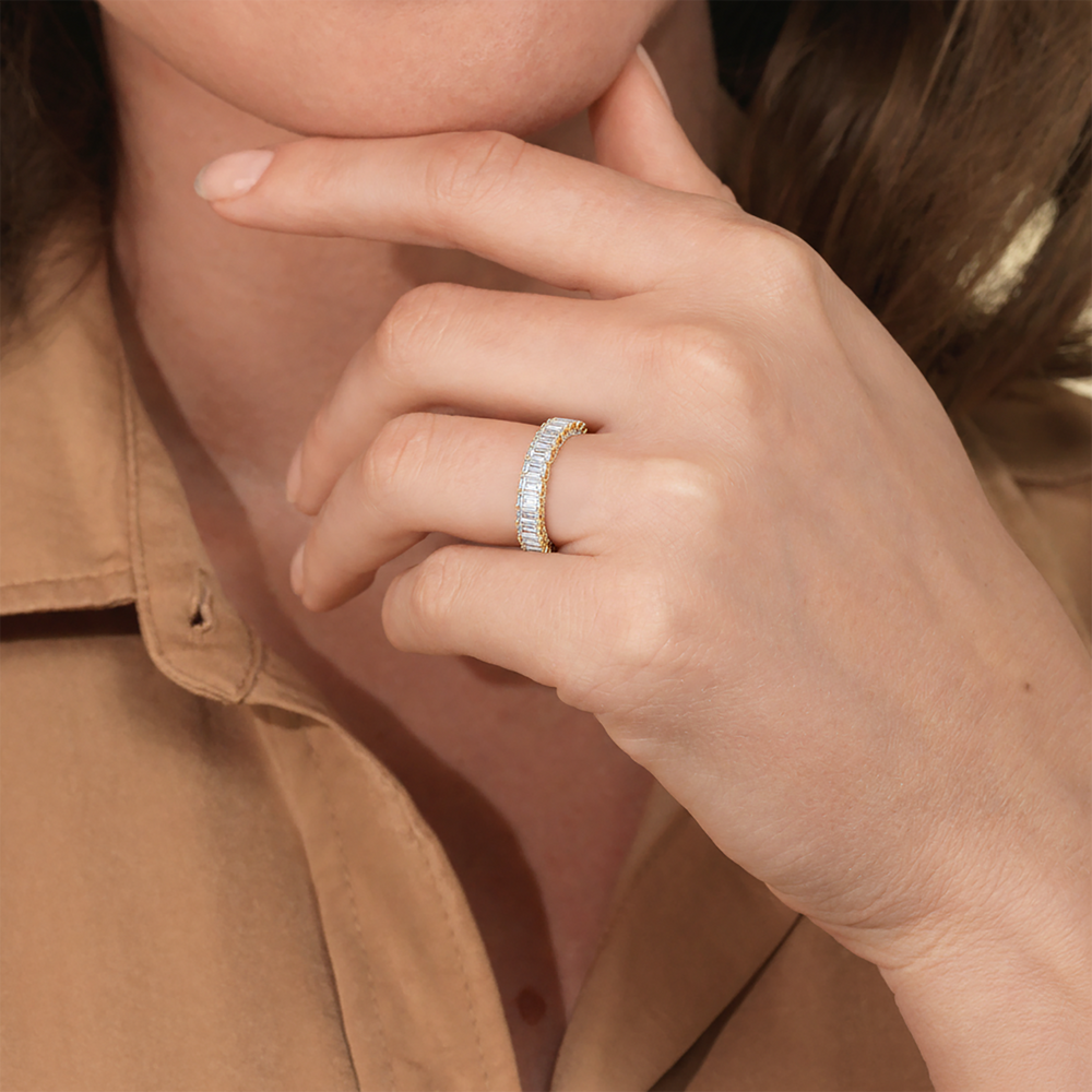 Model Wearing The Roosevelt Three Stone Trapezoid Diamond Wedding Band view