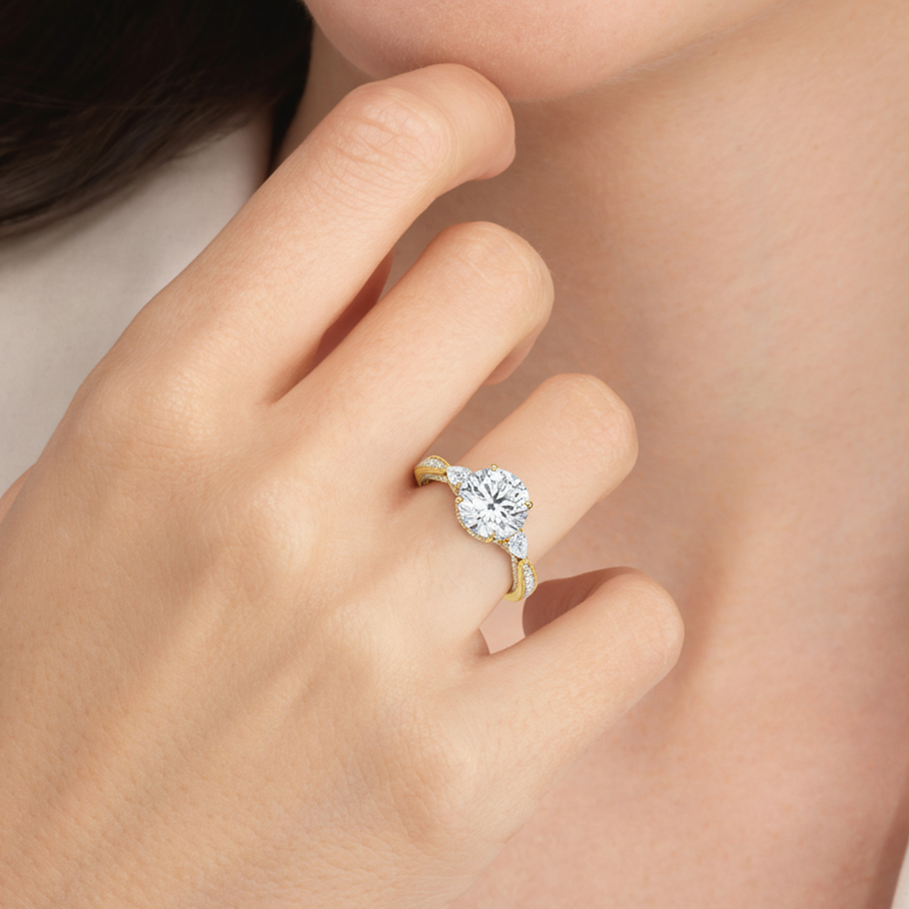 Model Wearing The Chrysler Pear Three Stone Ring view