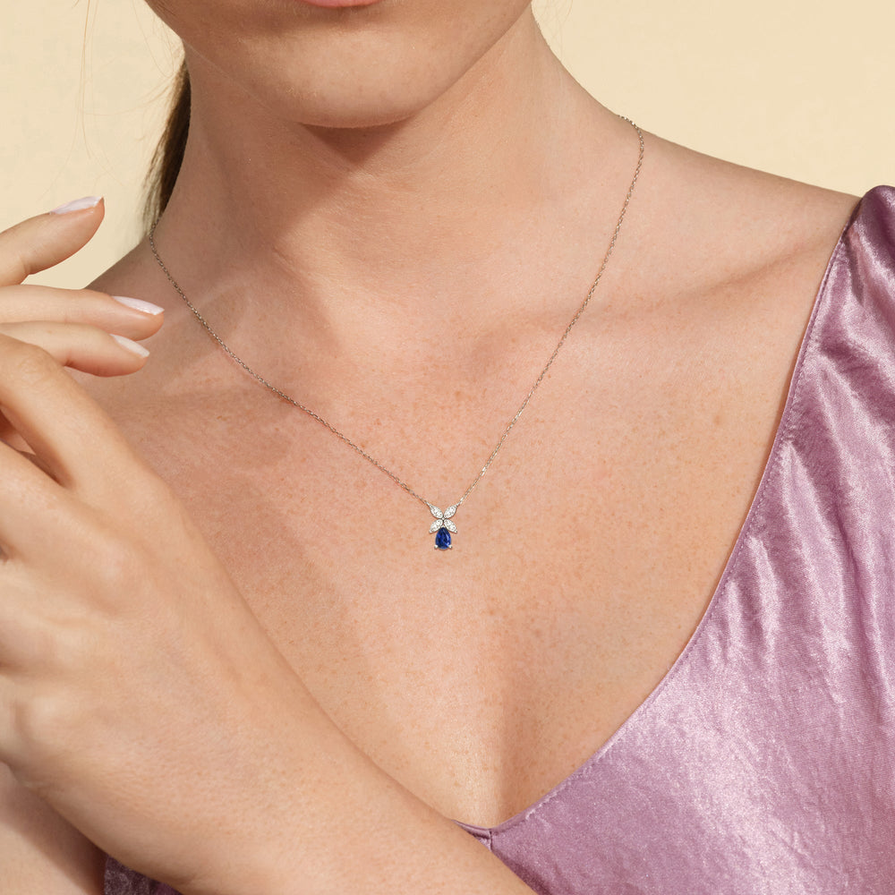 Model Wearing Sapphire and Diamond Tulip Drop Necklace view