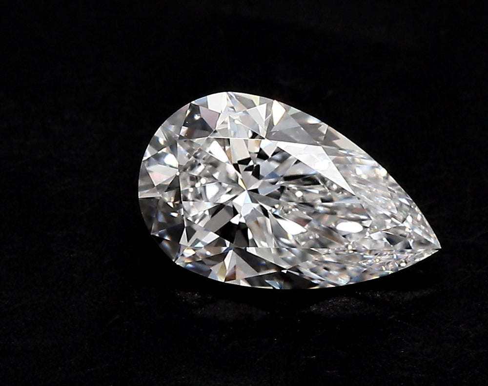 1.51 Carat Pear Lab Diamond with  Cut Diamond in 14KT  view 1
