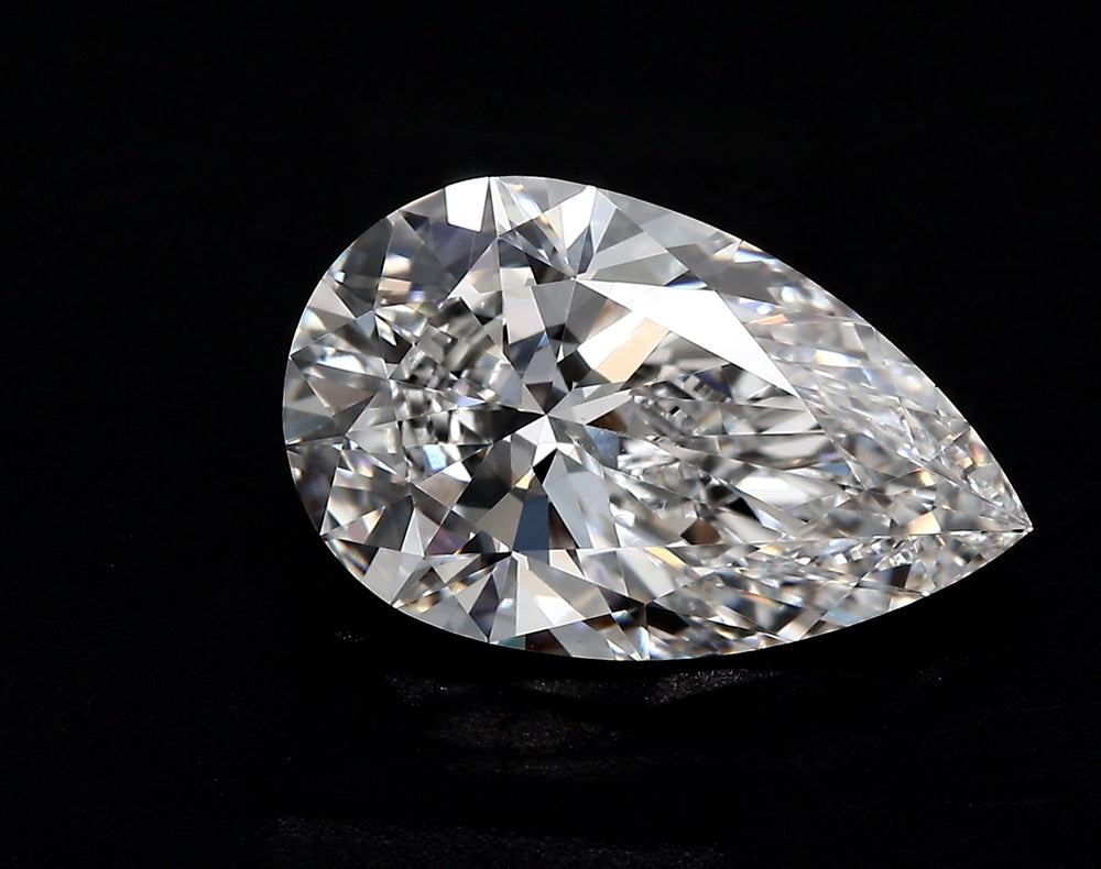 2.7 Carat Pear Lab Diamond with  Cut Diamond in 14KT  view 1
