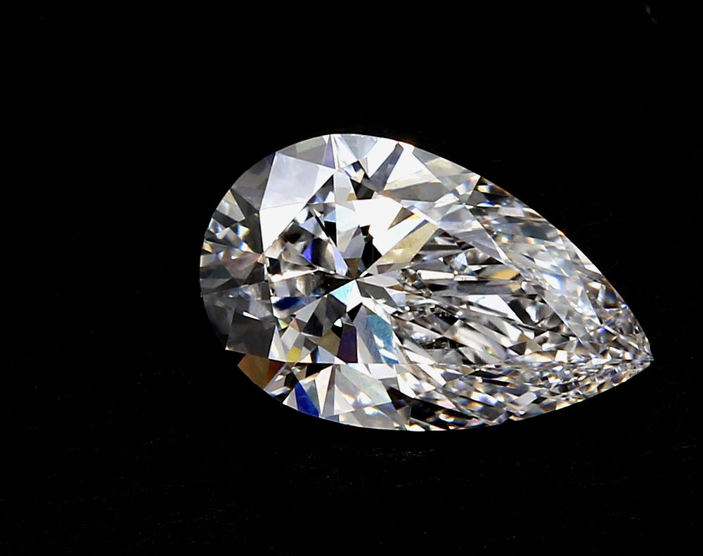 4.03 Carat Pear Lab Diamond with  Cut Diamond in 14KT  view 1
