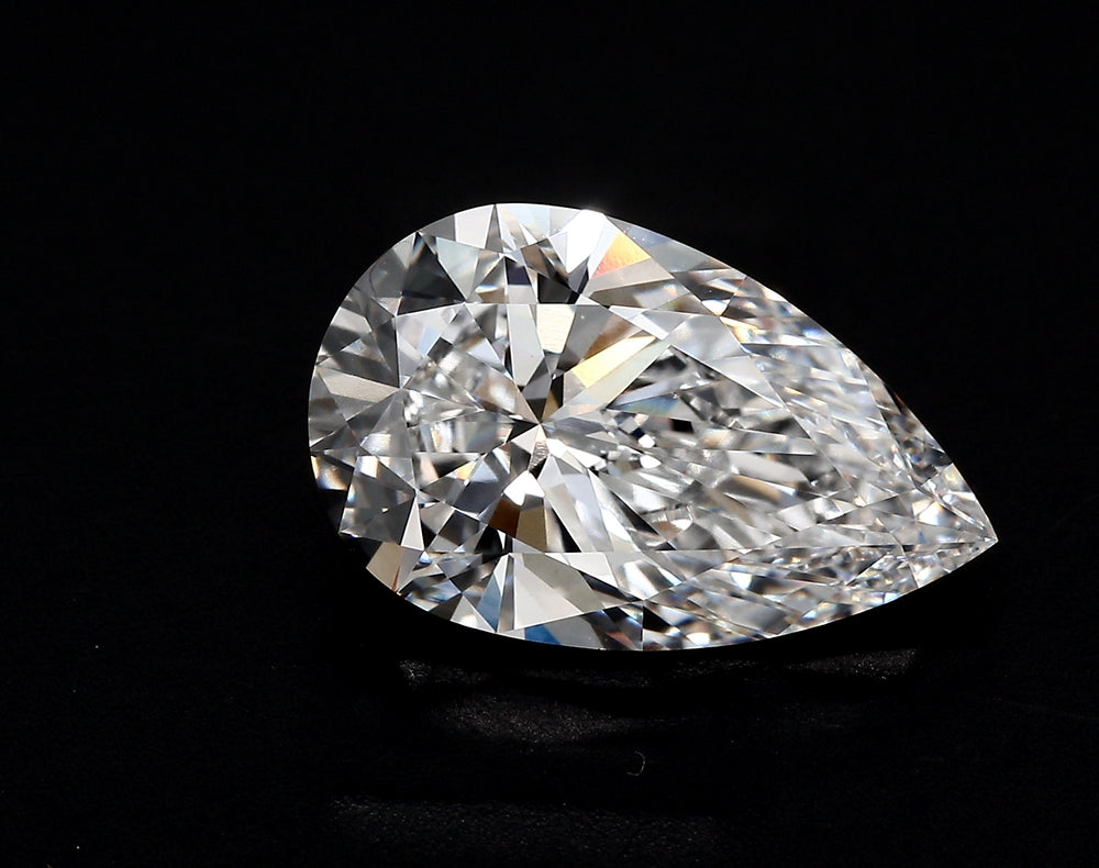3.52 Carat Pear Lab Diamond with  Cut Diamond in 14KT  view 1
