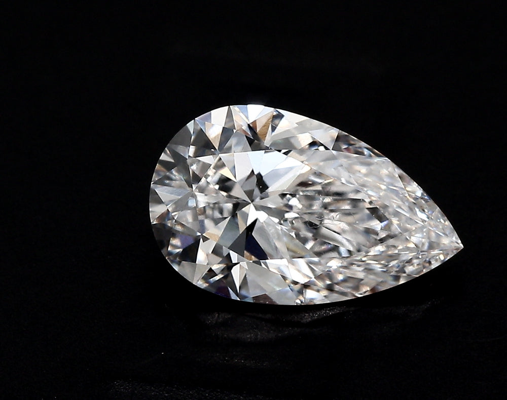 2.61 Carat Pear Lab Diamond with  Cut Diamond in 14KT  view 1
