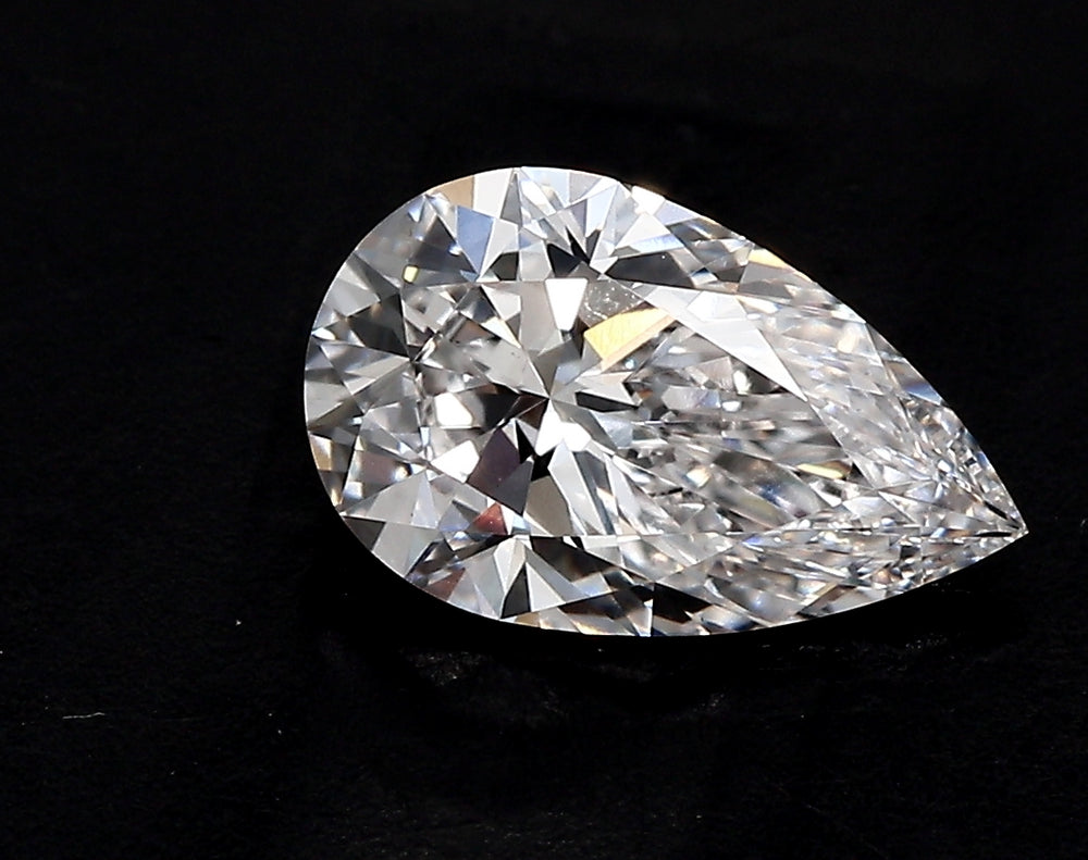 3.5 Carat Pear Lab Diamond with  Cut Diamond in 14KT  view 1
