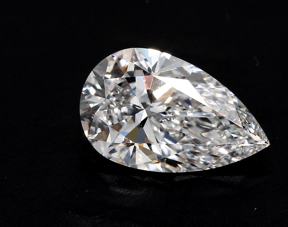 1.51 Carat Pear Lab Diamond with  Cut Diamond in 14KT  view 1
