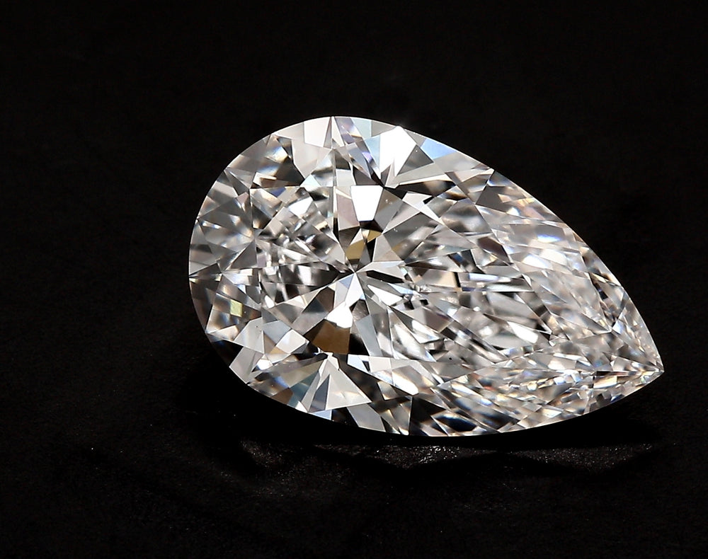 4.51 Carat Pear Lab Diamond with  Cut Diamond in 14KT  view 1
