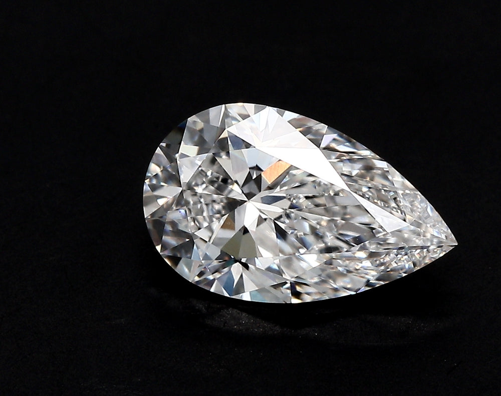 3.65 Carat Pear Lab Diamond with  Cut Diamond in 14KT  view 1
