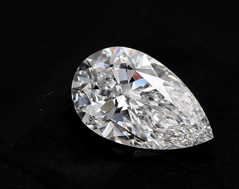 3.75 Carat Pear Lab Diamond with  Cut Diamond in 14KT  view 1
