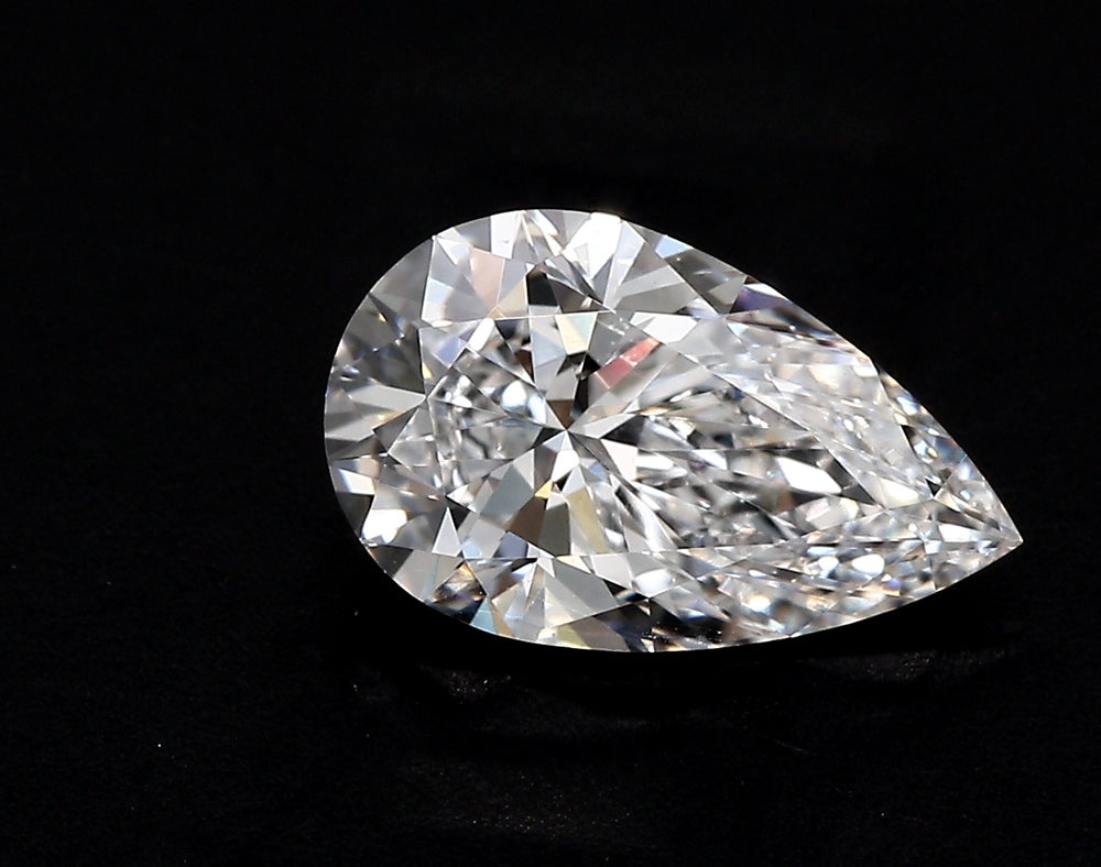 1.51 Carat Pear Lab Diamond with  Cut Diamond in 14KT  view 1
