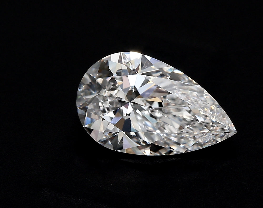2.45 Carat Pear Lab Diamond with  Cut Diamond in 14KT  view 1
