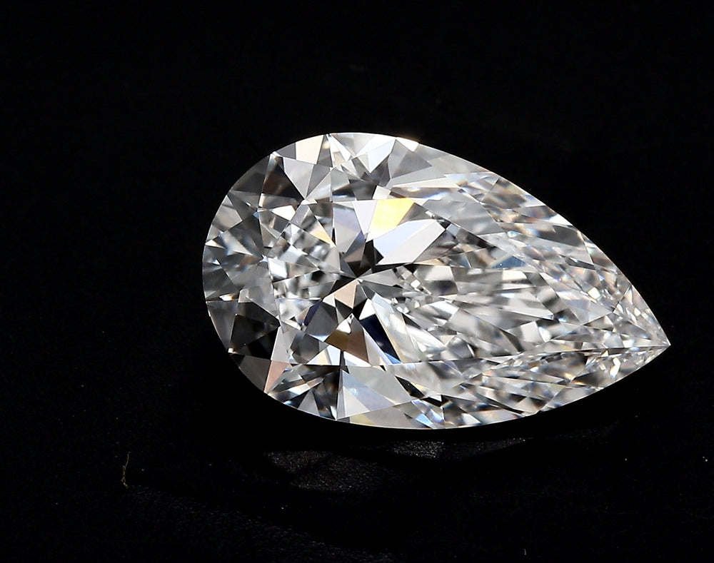 3.55 Carat Pear Lab Diamond with  Cut Diamond in 14KT  view 1
