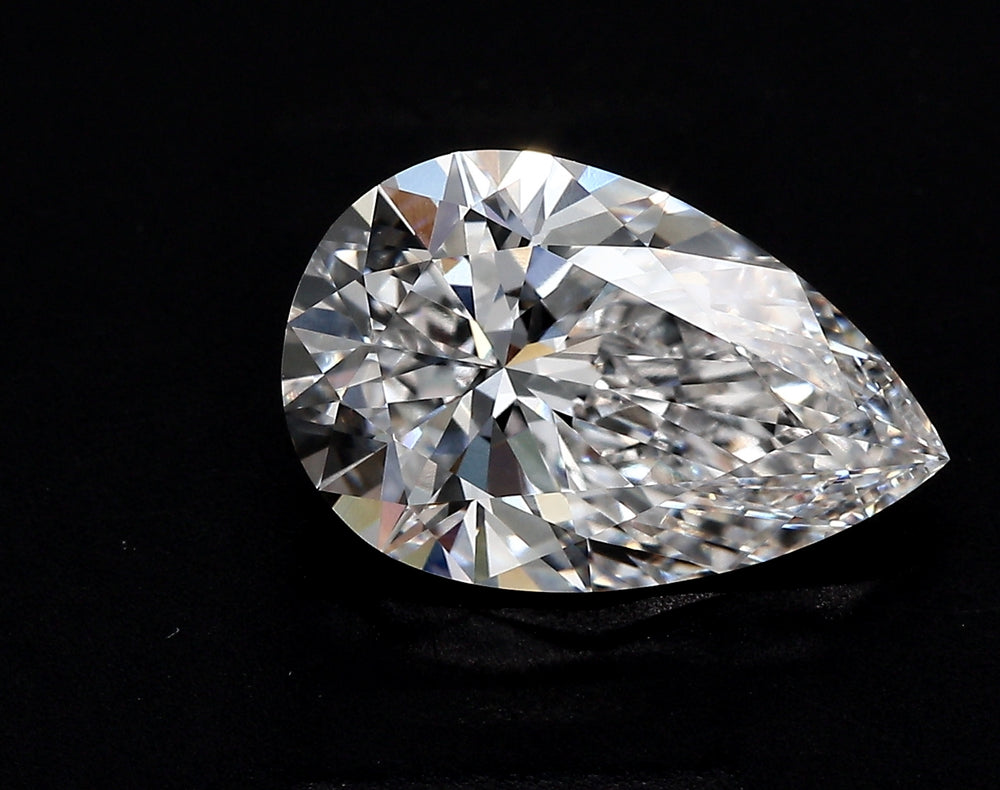 1.53 Carat Pear Lab Diamond with  Cut Diamond in 14KT  view 1
