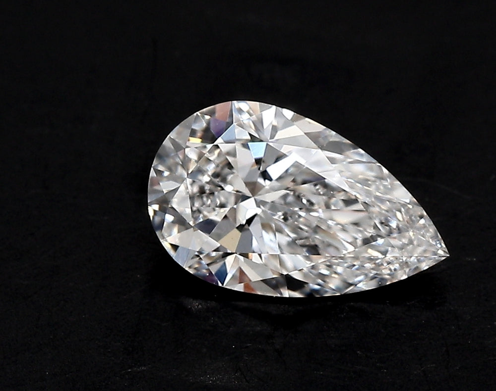 1.49 Carat Pear Lab Diamond with  Cut Diamond in 14KT  view 1

