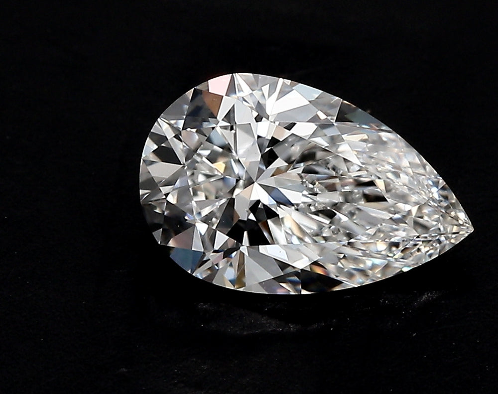 3.12 Carat Pear Lab Diamond with  Cut Diamond in 14KT  view 1

