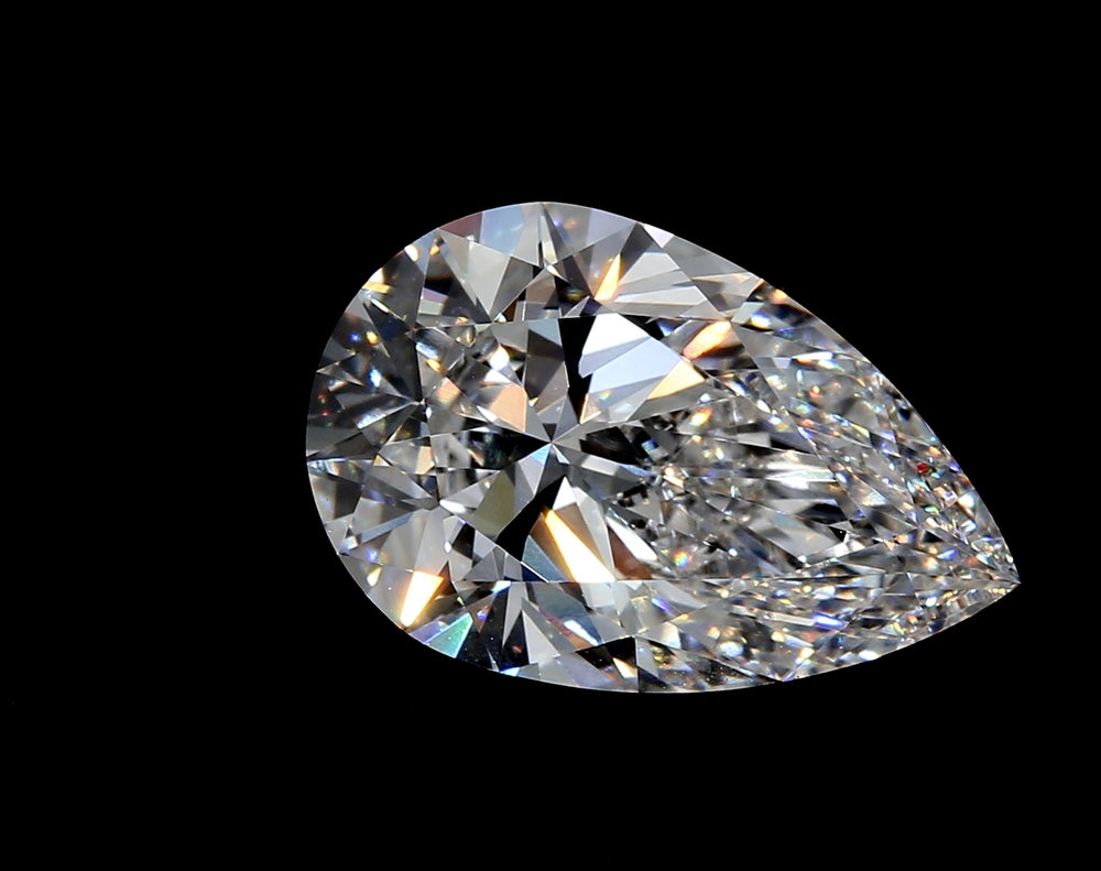 2.79 Carat Pear Lab Diamond with  Cut Diamond in 14KT  view 1
