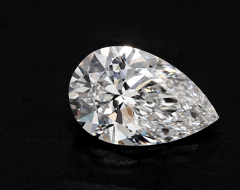 3.52 Carat Pear Lab Diamond with  Cut Diamond in 14KT  view 1
