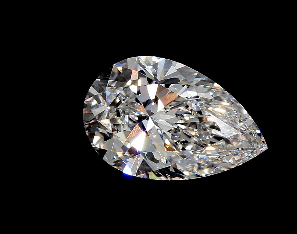 2.8 Carat Pear Lab Diamond with  Cut Diamond in 14KT  view 1

