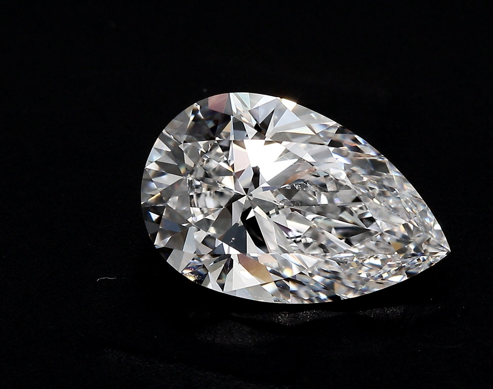 2.56 Carat Pear Lab Diamond with  Cut Diamond in 14KT  view 1
