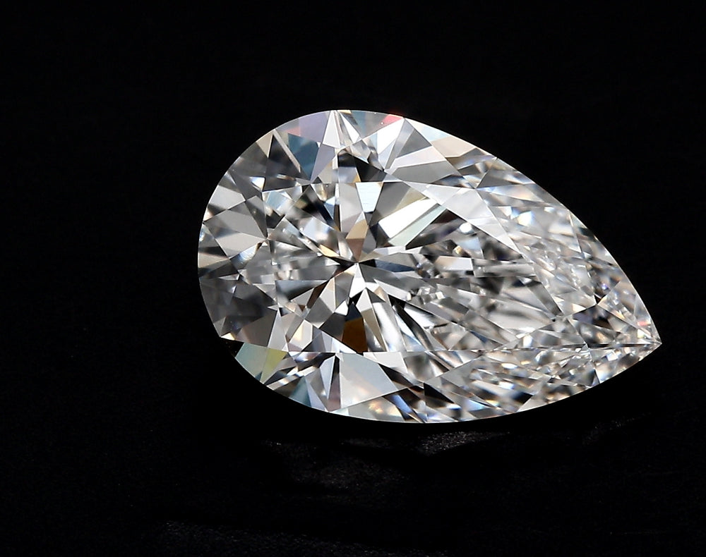 6.09 Carat Pear Lab Diamond with  Cut Diamond in 14KT  view 1
